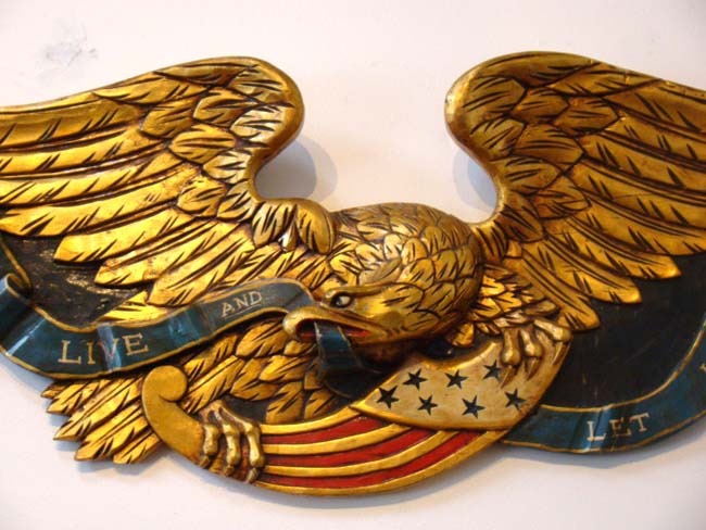 A mid century American carved eagle with motto "Live and Let Live"
